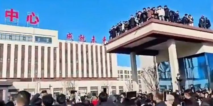 Protests turn violent in China after student falls to his death