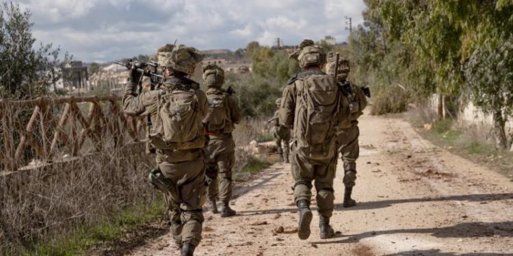 Israel keeps some troops in southern Lebanon in defiance of withdrawal deadline