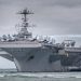 US Navy aircraft carrier collides with merchant ship near Suez Canal