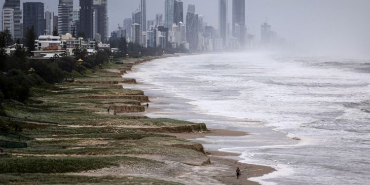 Tropical Cyclone Alfred whips up wind, rain on slow march to Australian coast