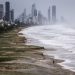 Tropical Cyclone Alfred whips up wind, rain on slow march to Australian coast