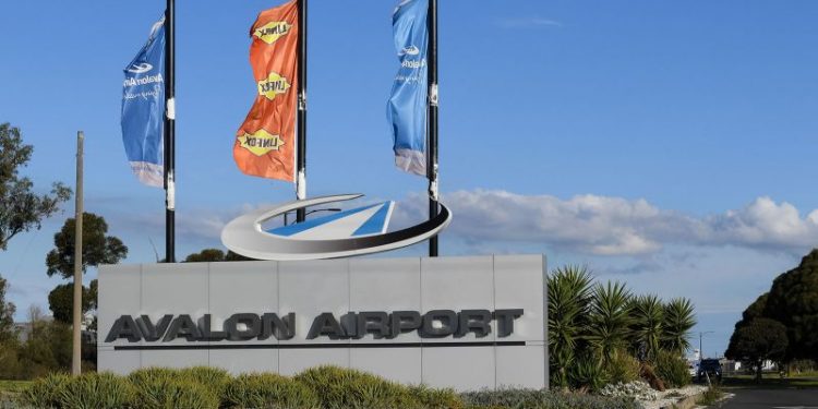 A boy with a loaded shotgun boarded a plane in Australia but was tackled by a former boxer