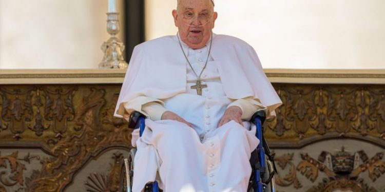 Pope Francis makes surprise public appearance after leaving hospital two weeks ago