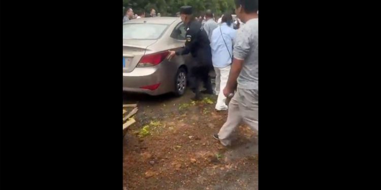 Car plows into crowd outside school in eastern China, injuring multiple people