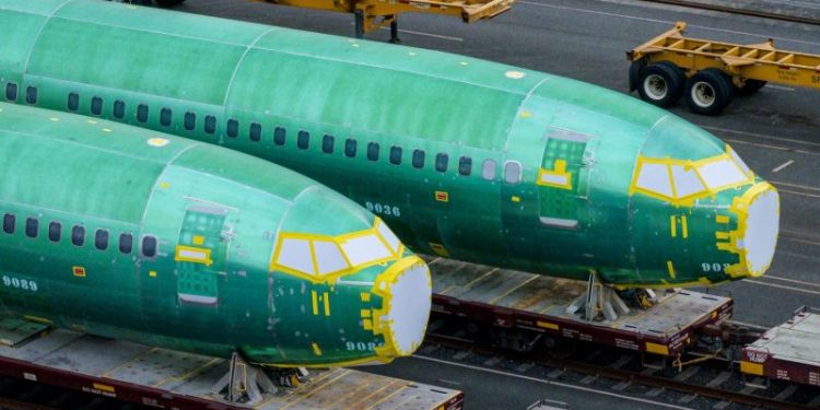 Boeing to resume airplane deliveries to China next month, ramp up Max production, CEO says