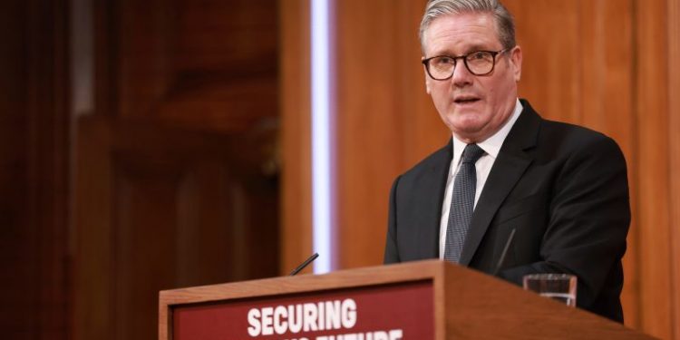 Britain sets out plan to toughen rules on migration, as Starmer combats surge in support for populists