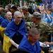 Soldiers return home after years in captivity as Ukraine-Russia prisoner swap begins