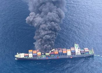 Indian coast guard battles massive fire on container ship listing off Kerala