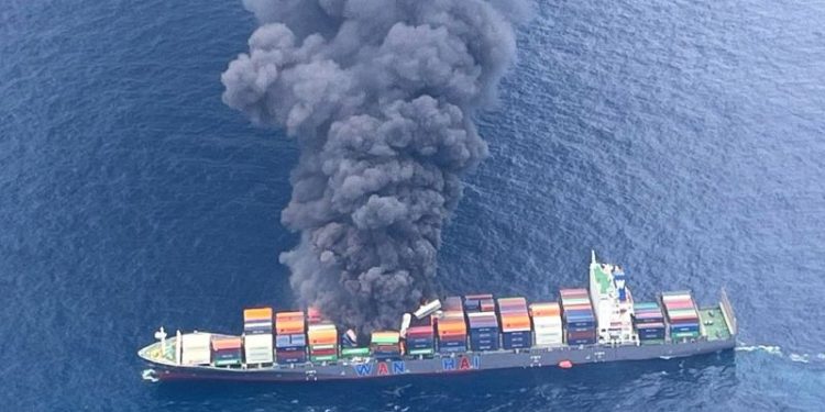 Indian coast guard battles massive fire on container ship listing off Kerala