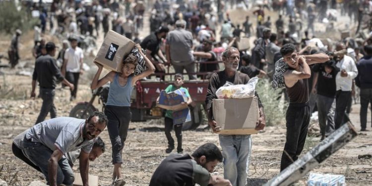 Controversial Gaza aid operation pauses for 24 hours after days of deadly shootings