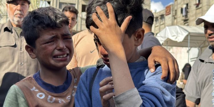 Dozens of Palestinians killed near Gaza aid distribution point, health officials say, in third day of shooting